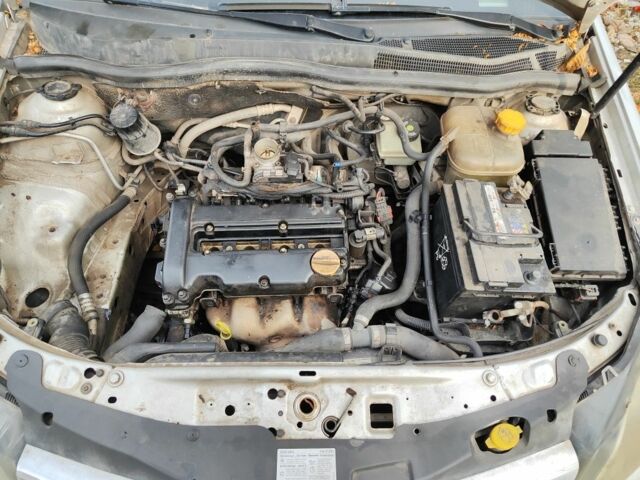 Серый Опель Астра, объемом двигателя 1.4 л и пробегом 250 тыс. км за 2600 $, фото 6 на Automoto.ua