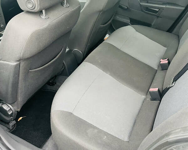 Серый Опель Астра, объемом двигателя 1.6 л и пробегом 217 тыс. км за 4400 $, фото 4 на Automoto.ua