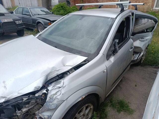 Серый Опель Астра, объемом двигателя 1.4 л и пробегом 123 тыс. км за 1300 $, фото 2 на Automoto.ua