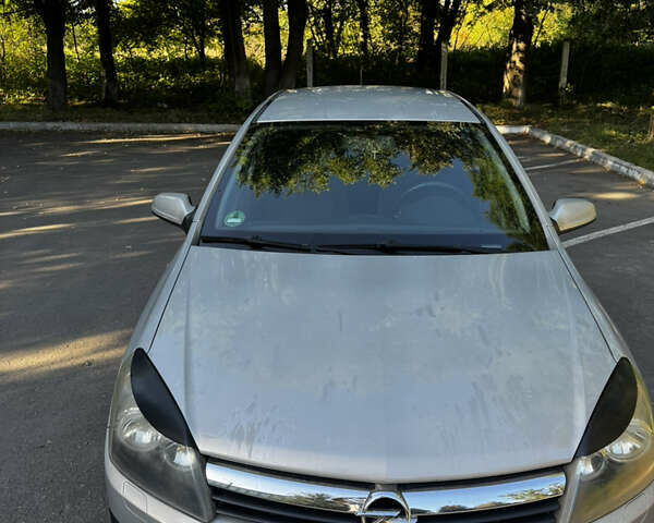 Серый Опель Астра, объемом двигателя 1.36 л и пробегом 211 тыс. км за 4200 $, фото 5 на Automoto.ua