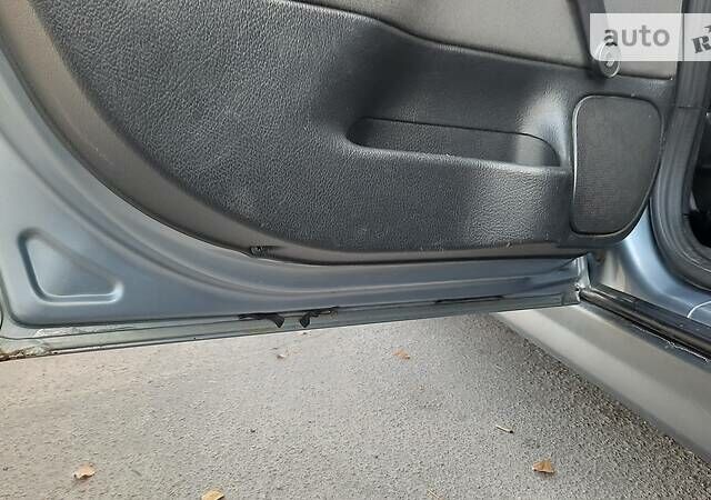 Серый Опель Астра, объемом двигателя 1.4 л и пробегом 280 тыс. км за 4000 $, фото 12 на Automoto.ua