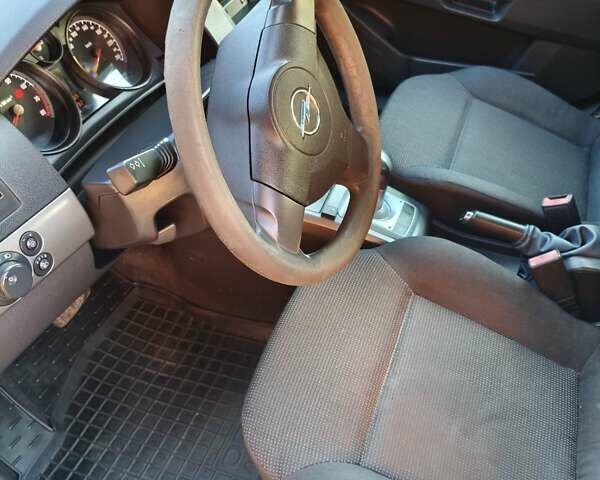 Серый Опель Астра, объемом двигателя 1.4 л и пробегом 216 тыс. км за 4500 $, фото 20 на Automoto.ua