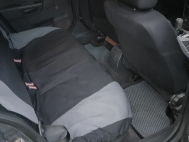 Серый Опель Астра, объемом двигателя 1.2 л и пробегом 325 тыс. км за 3750 $, фото 8 на Automoto.ua