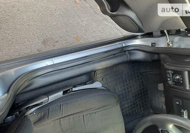 Серый Опель Астра, объемом двигателя 1.4 л и пробегом 280 тыс. км за 4000 $, фото 13 на Automoto.ua