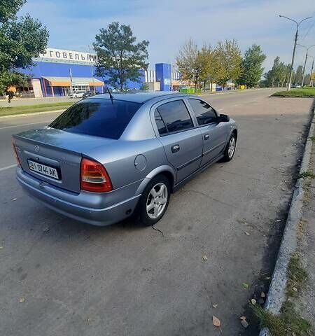 Серый Опель Астра, объемом двигателя 1.4 л и пробегом 280 тыс. км за 4000 $, фото 2 на Automoto.ua