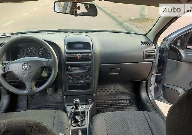 Серый Опель Астра, объемом двигателя 1.4 л и пробегом 280 тыс. км за 4000 $, фото 15 на Automoto.ua