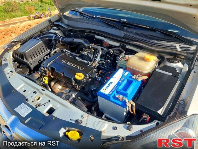 Серый Опель Астра, объемом двигателя 1.4 л и пробегом 171 тыс. км за 4950 $, фото 12 на Automoto.ua