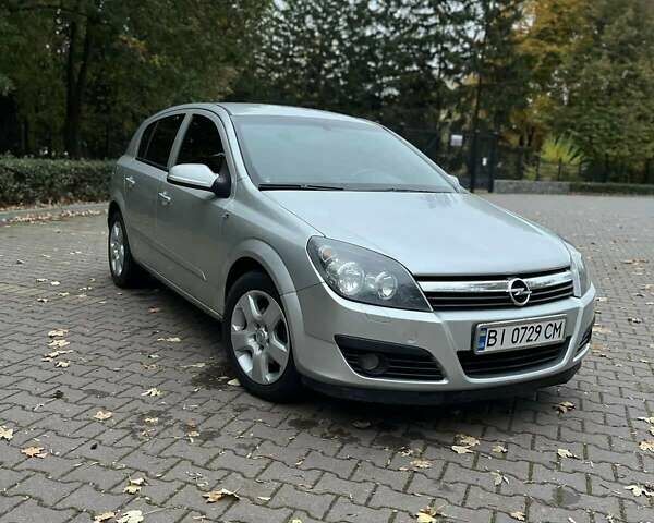 Серый Опель Астра, объемом двигателя 1.6 л и пробегом 248 тыс. км за 4400 $, фото 3 на Automoto.ua