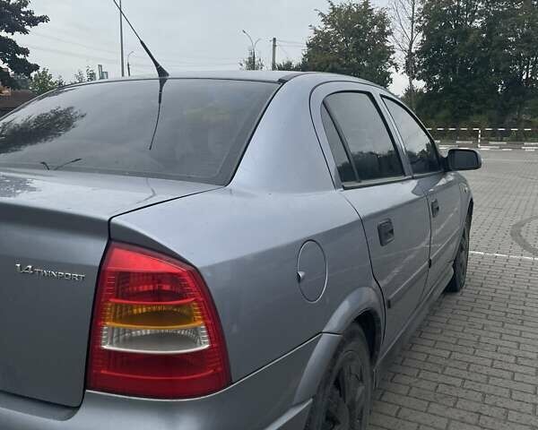 Сірий Опель Астра, об'ємом двигуна 1.39 л та пробігом 199 тис. км за 3600 $, фото 1 на Automoto.ua