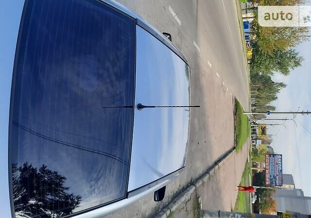 Серый Опель Астра, объемом двигателя 1.4 л и пробегом 280 тыс. км за 4000 $, фото 6 на Automoto.ua