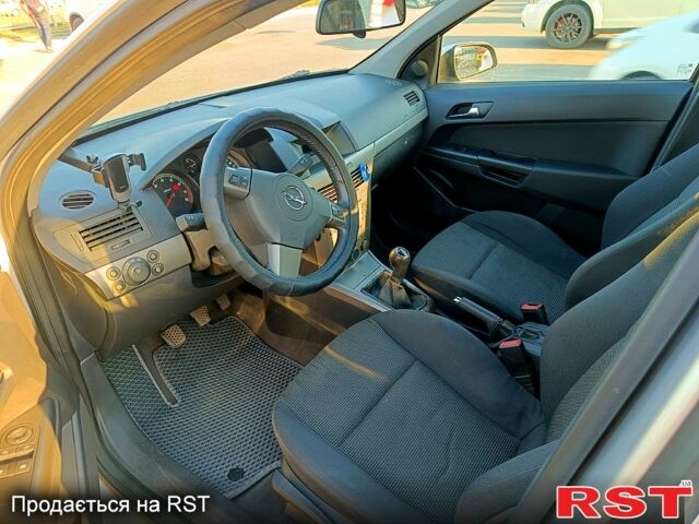 Серый Опель Астра, объемом двигателя 1.6 л и пробегом 117 тыс. км за 5000 $, фото 5 на Automoto.ua