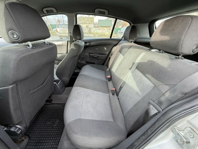 Серый Опель Астра, объемом двигателя 1.6 л и пробегом 315 тыс. км за 3900 $, фото 9 на Automoto.ua