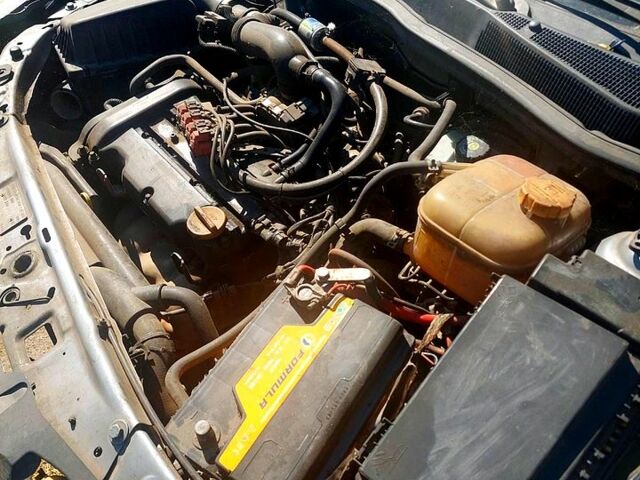 Серый Опель Астра, объемом двигателя 1.4 л и пробегом 350 тыс. км за 2200 $, фото 2 на Automoto.ua