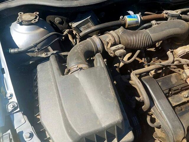 Серый Опель Астра, объемом двигателя 1.4 л и пробегом 350 тыс. км за 2200 $, фото 8 на Automoto.ua