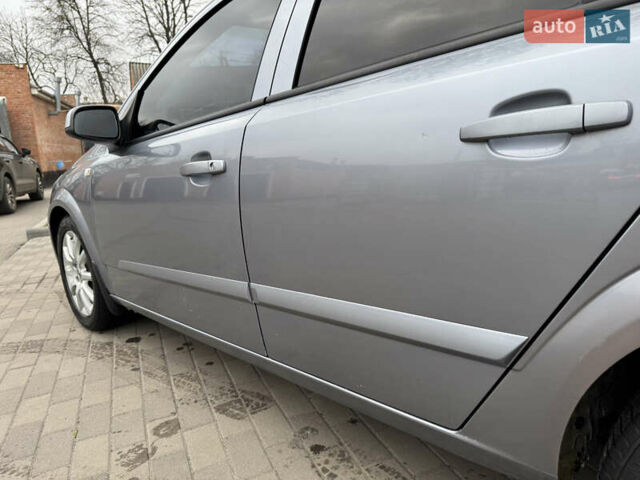 Серый Опель Астра, объемом двигателя 1.36 л и пробегом 215 тыс. км за 4800 $, фото 12 на Automoto.ua