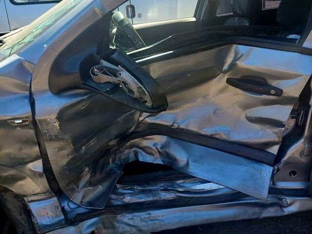 Серый Опель Астра, объемом двигателя 1.4 л и пробегом 350 тыс. км за 2200 $, фото 5 на Automoto.ua