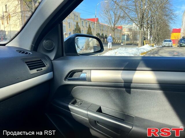 Серый Опель Астра, объемом двигателя 1.6 л и пробегом 188 тыс. км за 3900 $, фото 11 на Automoto.ua