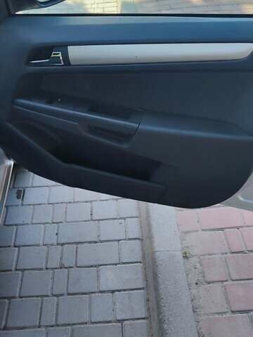 Серый Опель Астра, объемом двигателя 1.6 л и пробегом 164 тыс. км за 5999 $, фото 12 на Automoto.ua