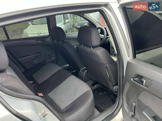 Серый Опель Астра, объемом двигателя 1.39 л и пробегом 222 тыс. км за 3999 $, фото 16 на Automoto.ua