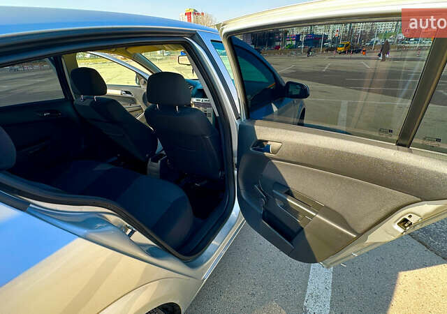 Серый Опель Астра, объемом двигателя 1.6 л и пробегом 235 тыс. км за 5200 $, фото 10 на Automoto.ua