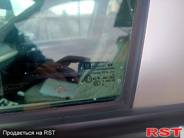 Серый Опель Астра, объемом двигателя 1.4 л и пробегом 246 тыс. км за 4700 $, фото 7 на Automoto.ua