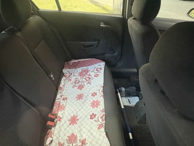 Серый Опель Астра, объемом двигателя 1.4 л и пробегом 145 тыс. км за 4500 $, фото 8 на Automoto.ua