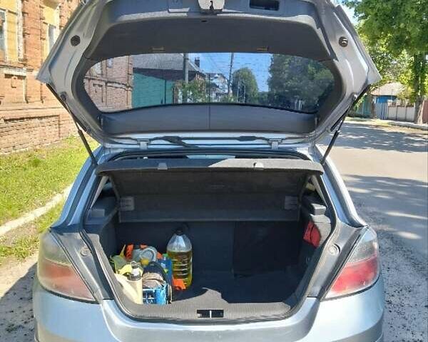 Серый Опель Астра, объемом двигателя 1.4 л и пробегом 333 тыс. км за 5100 $, фото 9 на Automoto.ua