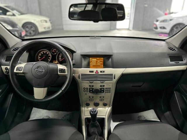 Серый Опель Астра, объемом двигателя 1.6 л и пробегом 117 тыс. км за 6999 $, фото 18 на Automoto.ua