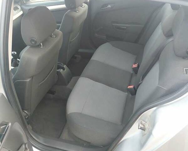 Серый Опель Астра, объемом двигателя 1.6 л и пробегом 223 тыс. км за 5600 $, фото 18 на Automoto.ua