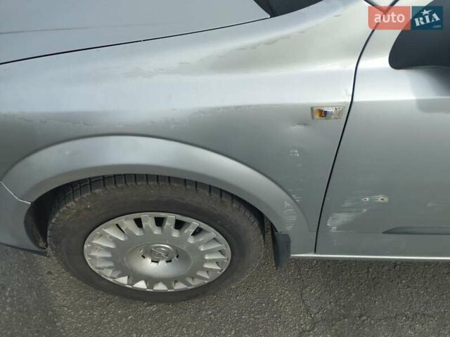 Серый Опель Астра, объемом двигателя 1.4 л и пробегом 202 тыс. км за 4200 $, фото 3 на Automoto.ua