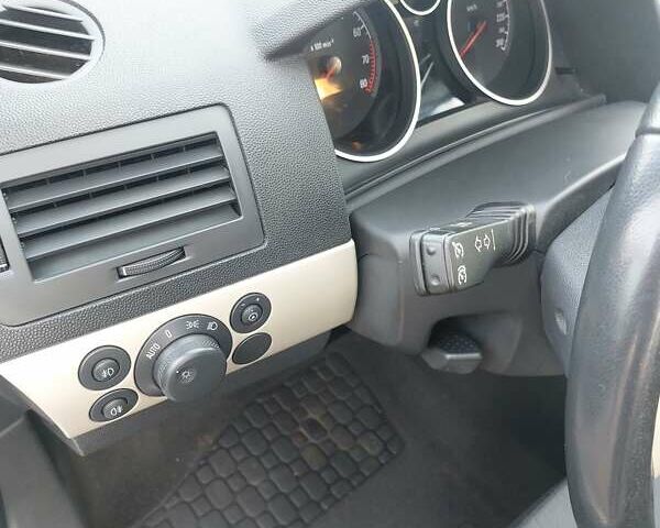 Серый Опель Астра, объемом двигателя 1.6 л и пробегом 223 тыс. км за 5600 $, фото 21 на Automoto.ua