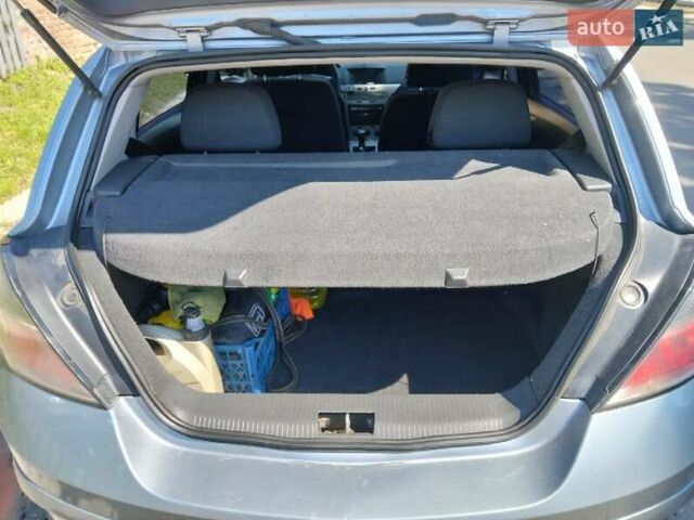 Серый Опель Астра, объемом двигателя 1.4 л и пробегом 333 тыс. км за 5100 $, фото 7 на Automoto.ua