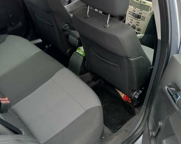 Серый Опель Астра, объемом двигателя 1.7 л и пробегом 218 тыс. км за 5200 $, фото 10 на Automoto.ua