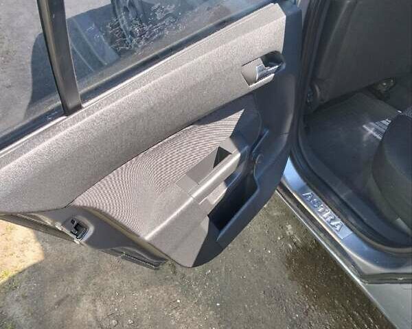 Серый Опель Астра, объемом двигателя 1.4 л и пробегом 333 тыс. км за 5100 $, фото 18 на Automoto.ua