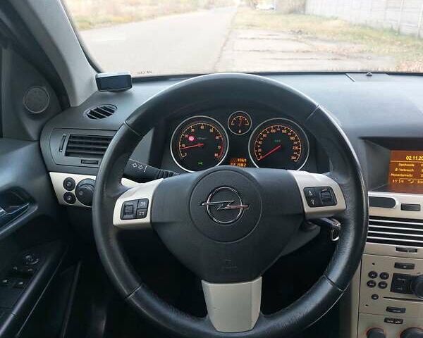 Серый Опель Астра, объемом двигателя 1.6 л и пробегом 223 тыс. км за 5600 $, фото 43 на Automoto.ua