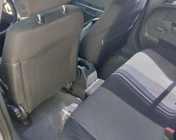 Серый Опель Астра, объемом двигателя 1.4 л и пробегом 333 тыс. км за 5100 $, фото 23 на Automoto.ua