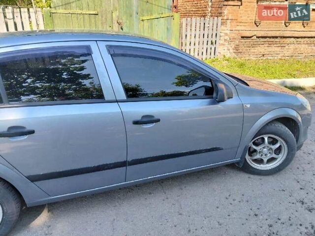 Серый Опель Астра, объемом двигателя 1.4 л и пробегом 333 тыс. км за 5100 $, фото 13 на Automoto.ua