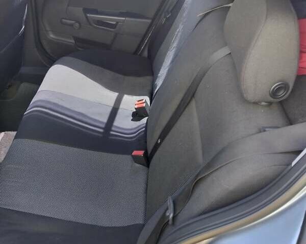 Серый Опель Астра, объемом двигателя 1.4 л и пробегом 333 тыс. км за 5100 $, фото 22 на Automoto.ua