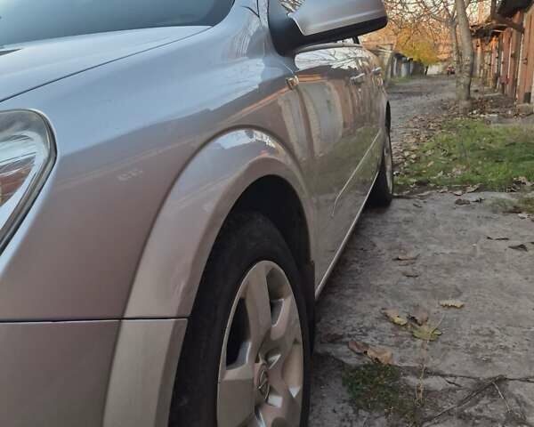 Серый Опель Астра, объемом двигателя 1.3 л и пробегом 250 тыс. км за 6350 $, фото 6 на Automoto.ua