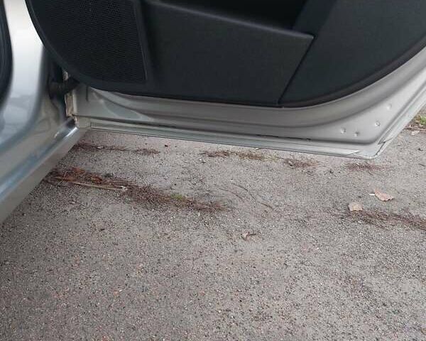 Серый Опель Астра, объемом двигателя 1.6 л и пробегом 223 тыс. км за 5600 $, фото 35 на Automoto.ua