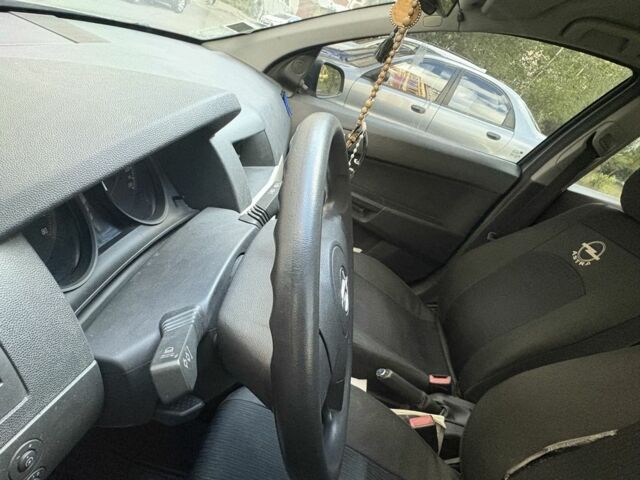 Серый Опель Астра, объемом двигателя 1.4 л и пробегом 145 тыс. км за 4500 $, фото 9 на Automoto.ua