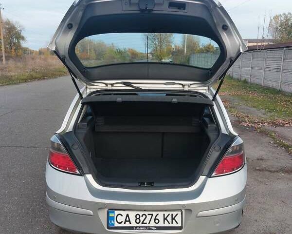 Серый Опель Астра, объемом двигателя 1.6 л и пробегом 223 тыс. км за 5600 $, фото 28 на Automoto.ua