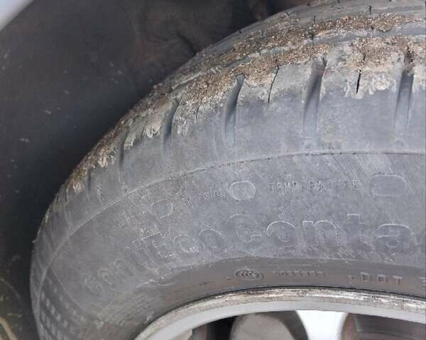 Серый Опель Астра, объемом двигателя 1.4 л и пробегом 333 тыс. км за 5100 $, фото 12 на Automoto.ua