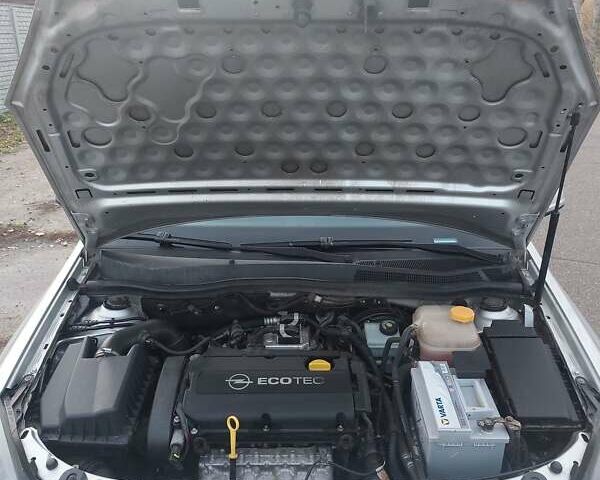 Серый Опель Астра, объемом двигателя 1.6 л и пробегом 223 тыс. км за 5600 $, фото 41 на Automoto.ua