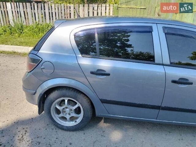 Серый Опель Астра, объемом двигателя 1.4 л и пробегом 333 тыс. км за 5100 $, фото 11 на Automoto.ua