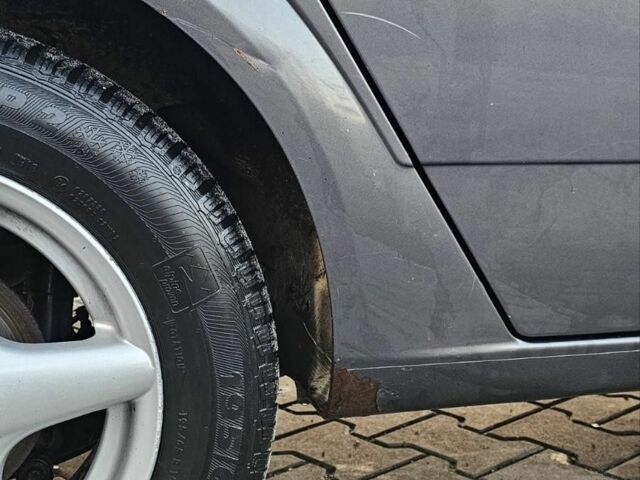 Серый Опель Астра, объемом двигателя 1.4 л и пробегом 191 тыс. км за 3700 $, фото 4 на Automoto.ua