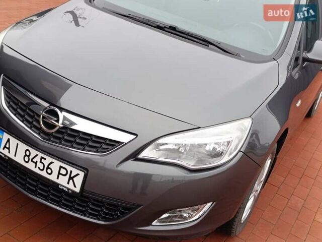Серый Опель Астра, объемом двигателя 1.6 л и пробегом 141 тыс. км за 7999 $, фото 4 на Automoto.ua