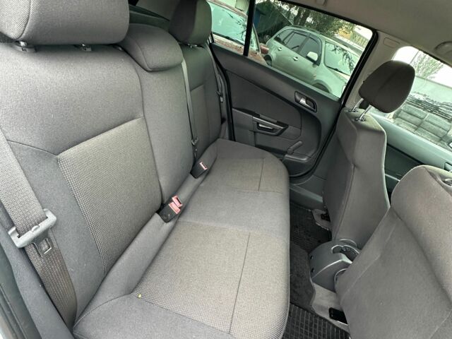 Серый Опель Астра, объемом двигателя 1.4 л и пробегом 229 тыс. км за 5500 $, фото 3 на Automoto.ua