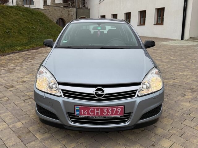 Серый Опель Астра, объемом двигателя 1.4 л и пробегом 205 тыс. км за 4400 $, фото 3 на Automoto.ua