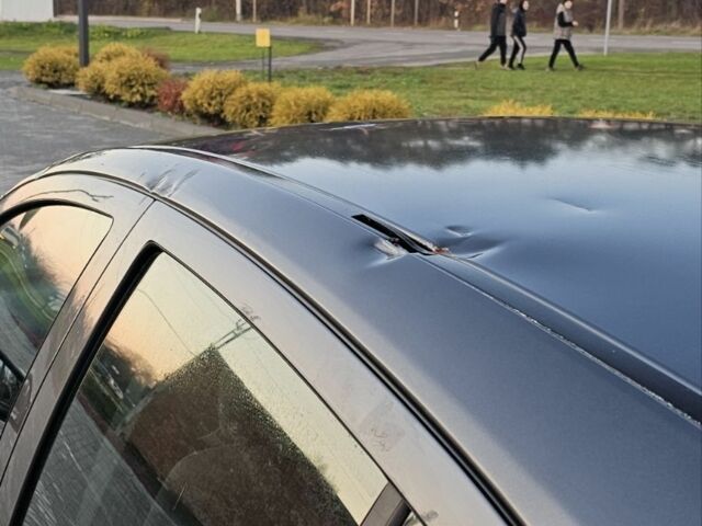 Серый Опель Астра, объемом двигателя 1.4 л и пробегом 191 тыс. км за 3700 $, фото 6 на Automoto.ua